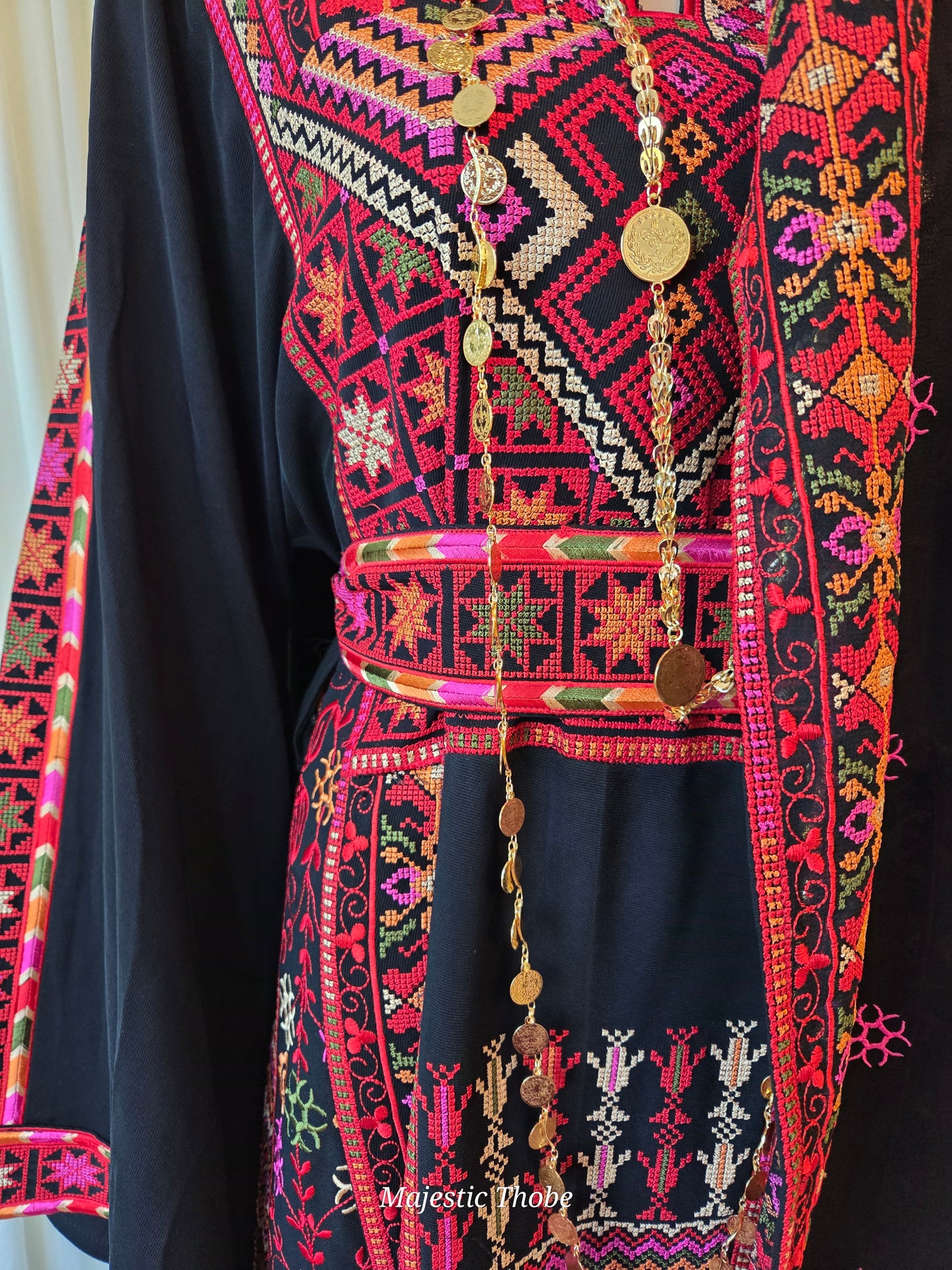 The Carmen Thobe - Palestinian Embroidered Black & Red Thobe with Matching Head Veil, Belt & Extra Long Sleeves | Traditional Tatreez Dress