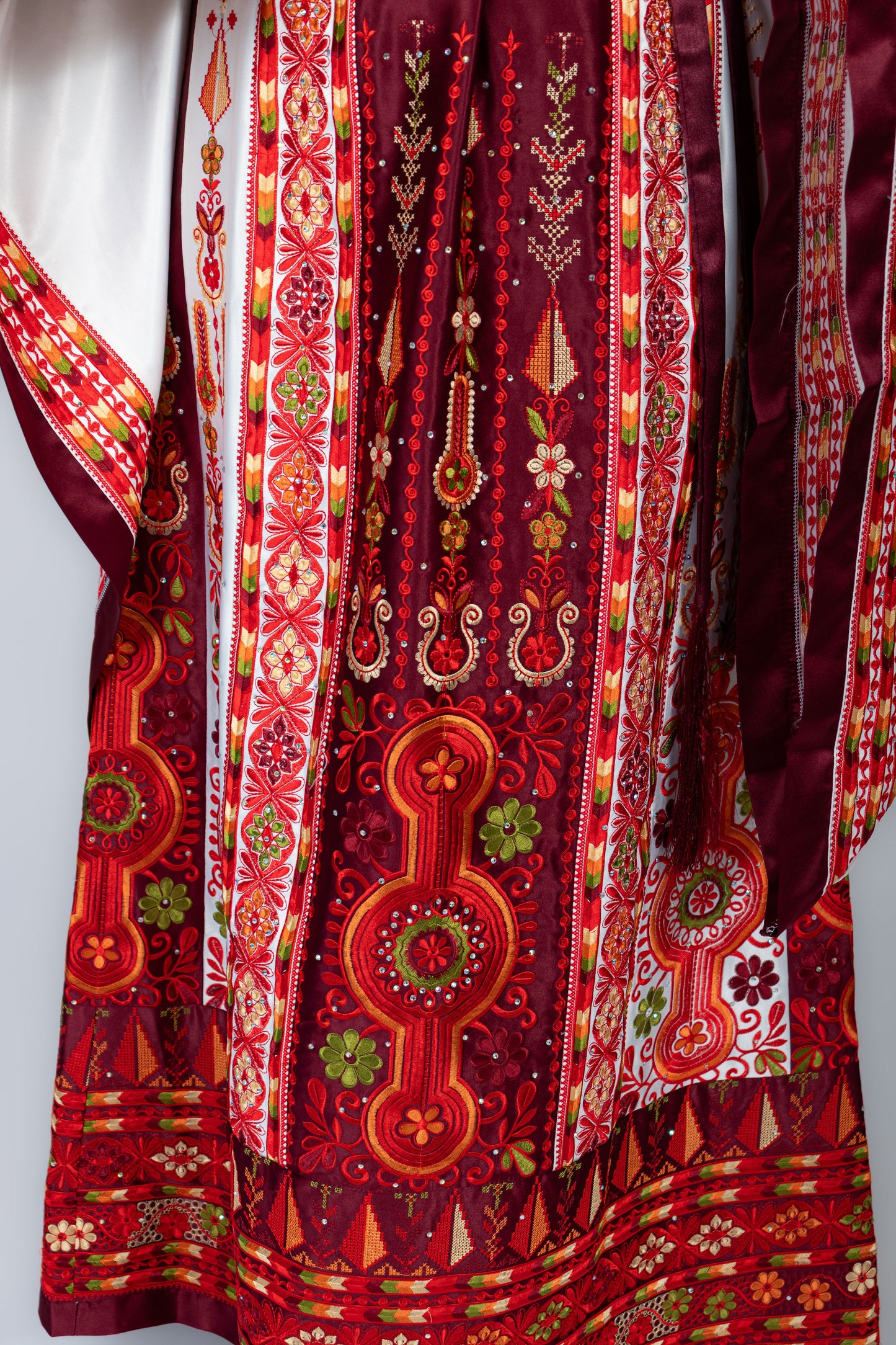 The Celine Thobe - Palestinian Embroidered White & Burgendy Thobe with Matching Head Veil, Belt & Extra Long Sleeves | Traditional Tatreez Dress